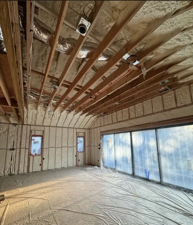Interior walls and ceiling insulated with spray foam during new construction in West Slope